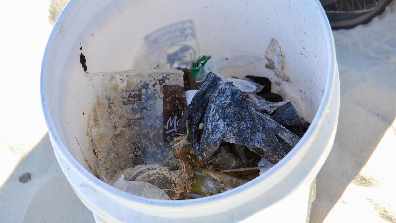 Bucket full of trash.