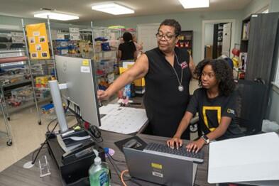 Demi Johnson working at the Willie Lock Resource &amp; Referral. Photo by Kevin Hudson.