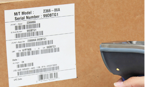 A cardboard box with a label with multiple bar codes. 